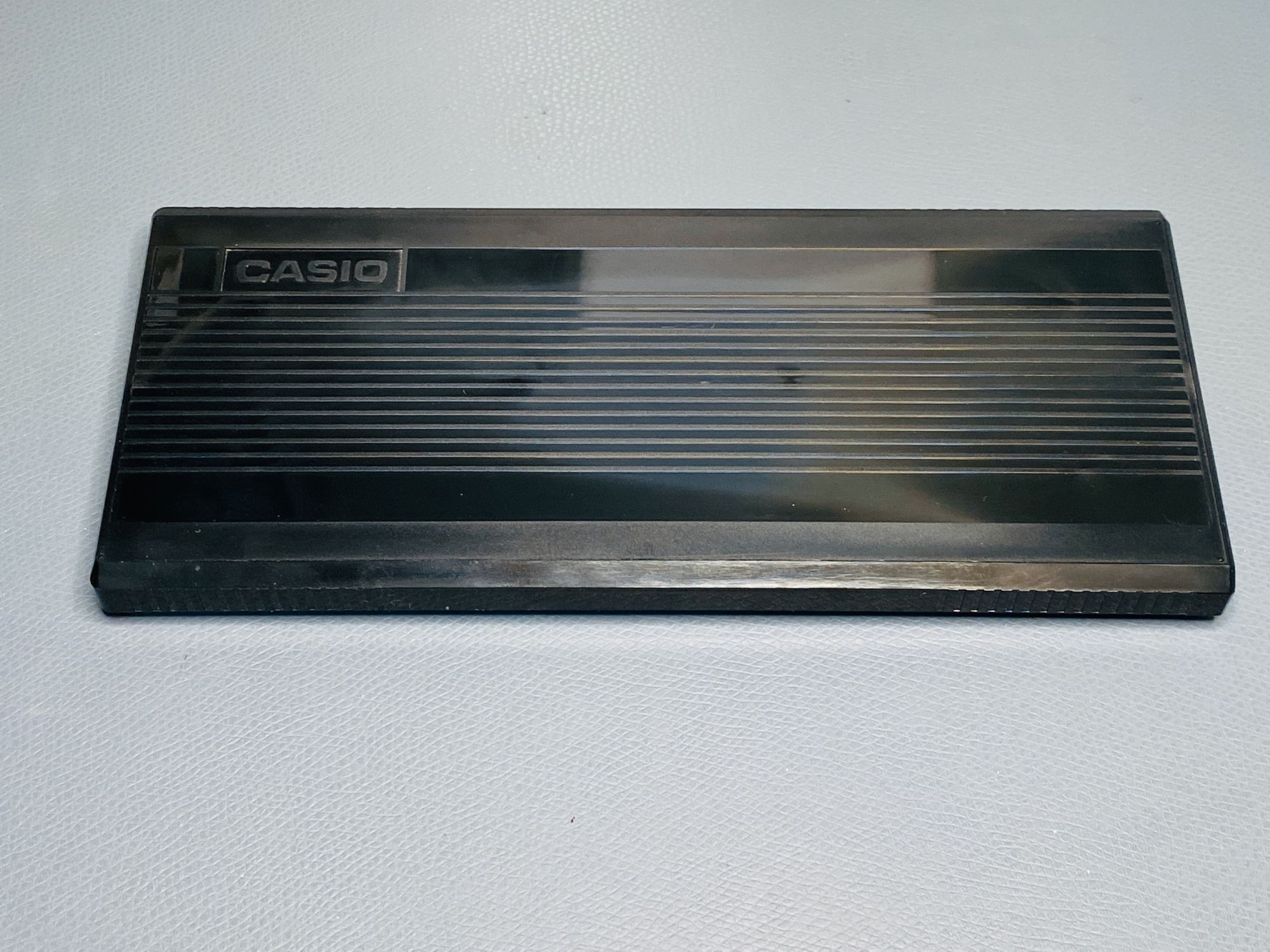 The FX-880P encased with a sliding cover.